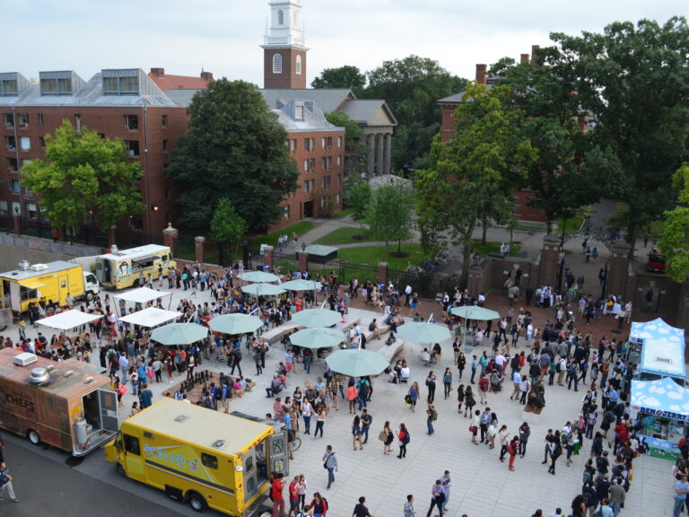 Smith Campus Center Plaza during an event with food trucks lining the perimeter.