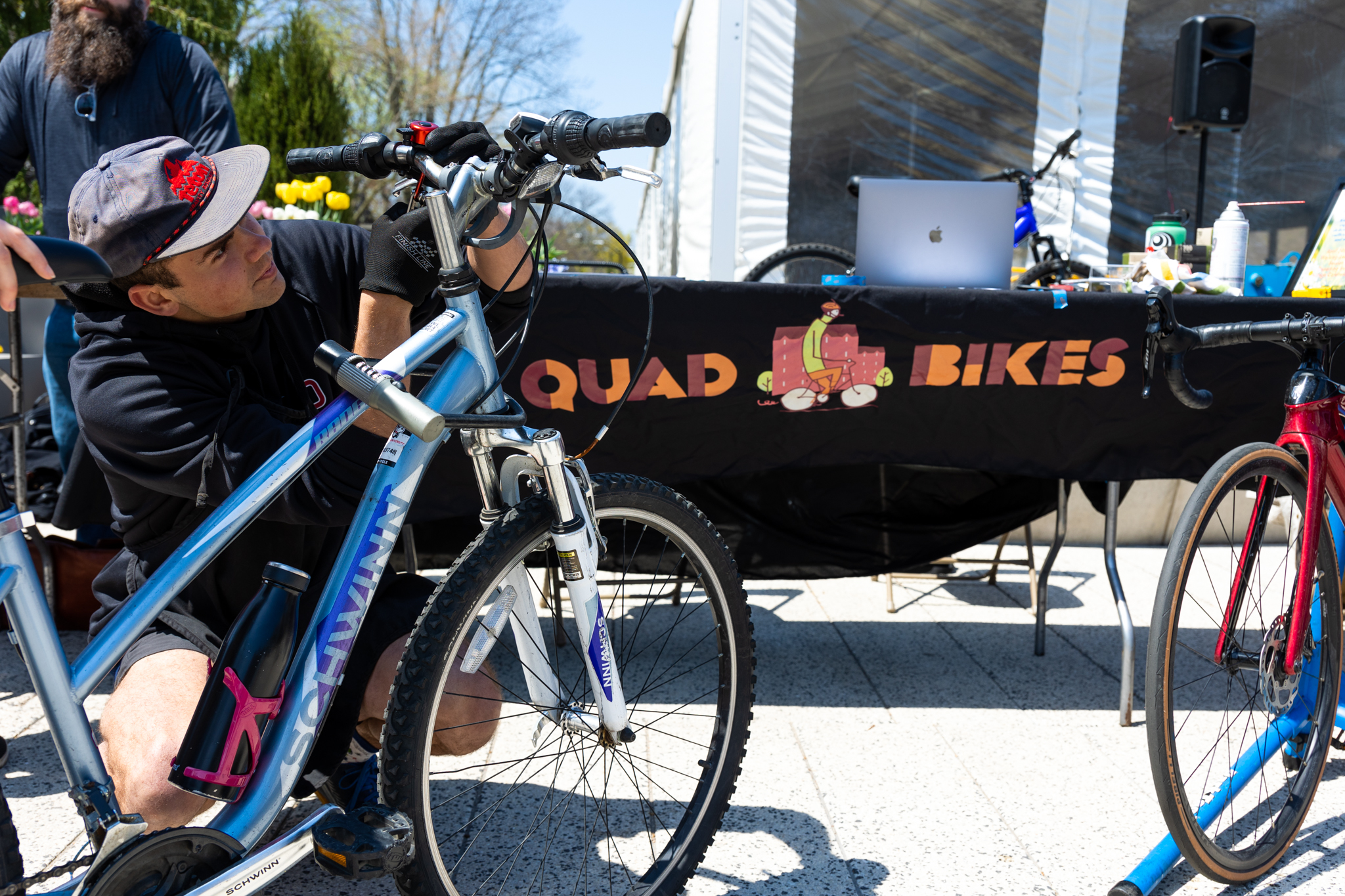 Bike repairs at Quad Bikes student tabling event on Earth Day at Harvard in 2023.