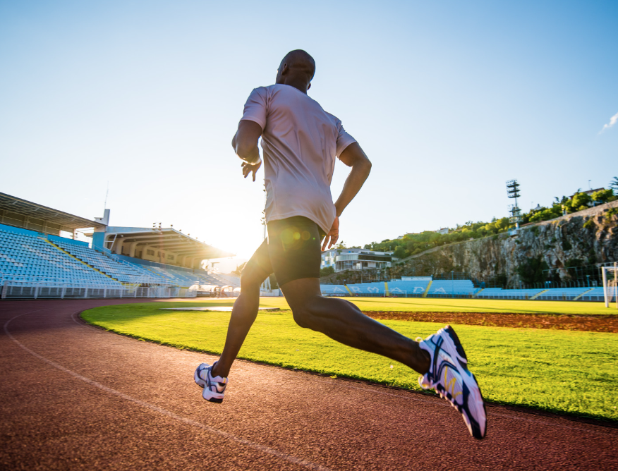 A person running on a track and field track