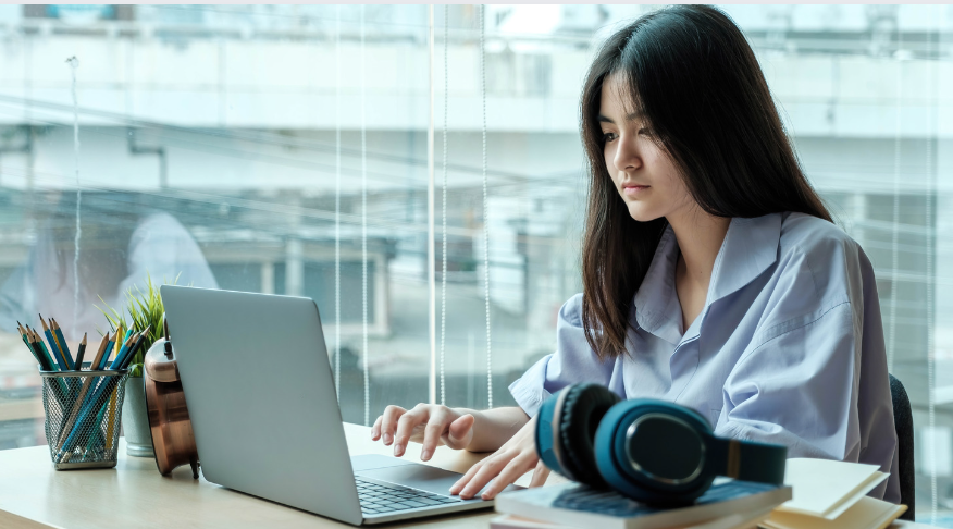 Student working on their laptop